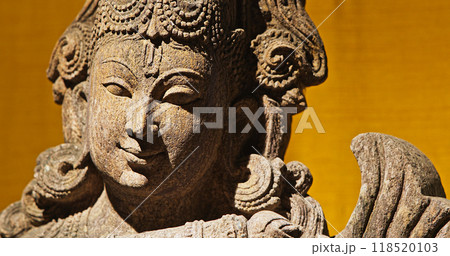 Close-up view on Statue Of Krishna Playing Flute. Krishnas Love Songs Are Both Shravya And Drishya -heard And Seen-. Krishna Is Major Deity In Hinduism. He Is God Of Protection, Compassion, Tenderness 118520103