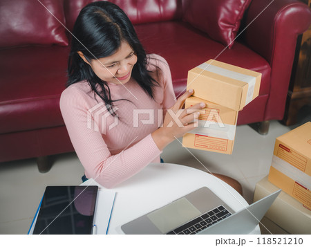 Live to sell products, woman blogger review products from camera on her phone, Business online influencer on social media concept, Ecommerce business live streaming vlog new normal concept. 118521210