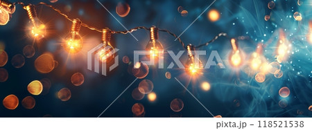 Glowing garland with light bulbs, defocused bokeh background. Festive illuminating decoration 118521538