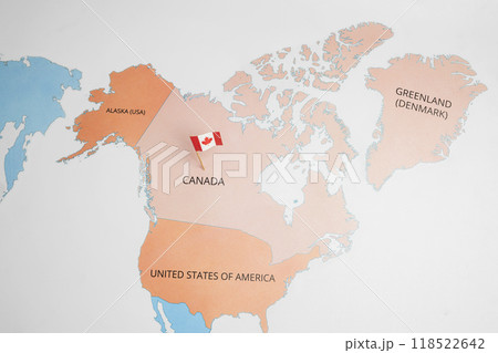 A map of Canada with a Canadian flag on it A map of Canada with a Canadian flag on it 118522642