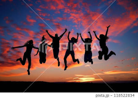 Silhouette of jumping people. Concept of travel, friendship and togetherness. Summer sunset on beach and group of young men. Young friends. Outdoors leisure and enjoyment 118522834