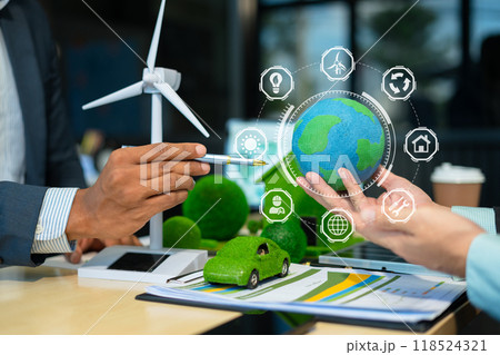 Holding a light bulb against nature on green leaf with energy source icon for renewable and sustainable development, ecology concept. Holding a light bulb against nature on green leaf with energy source icon for renewable and sustainable development, ecology concept. 118524321
