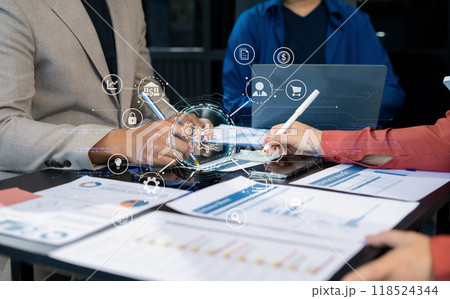 Business team present. professional investor working new start up project. Finance managers meeting.using smart phone and laptop and digital tablet computer in modern office. Business team present. professional investor working new start up project. Finance managers meeting.using smart phone and laptop and digital tablet computer in modern office. 118524344