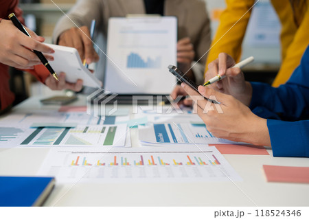 Business team present. professional investor working new start up project. Finance managers meeting.using smart phone and laptop and digital tablet computer in modern office. Business team present. professional investor working new start up project. Finance managers meeting.using smart phone and laptop and digital tablet computer in modern office. 118524346