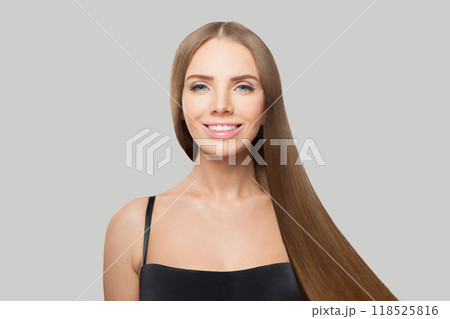 Nice woman with long healthy straight shiny hairstyle, make-up and fresh skin posing  118525816