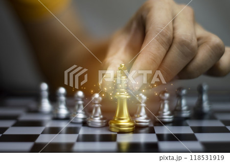Businessman concept holding golden king chess The concept of delegating leadership, leadership success Businessman concept holding golden king chess The concept of delegating leadership, leadership success 118531919