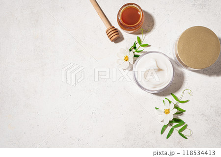 Cosmetic rich cream with natural honey Cosmetic rich cream with natural honey 118534413