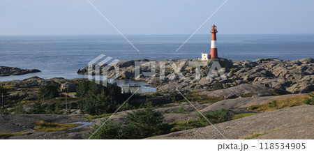 Eigeroy lighthouse, rock formations and North Sea, Norway. 118534905
