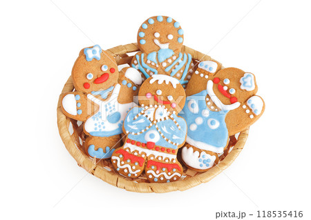 christmas gingerbread cookie in a wicker basket isolated on white background. Top view. Flat lay 118535416