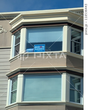 San Francisco, California, USA - 09.20.2024: Election posters on the windows of houses in the city. Elections 2024. Harris. 118536443
