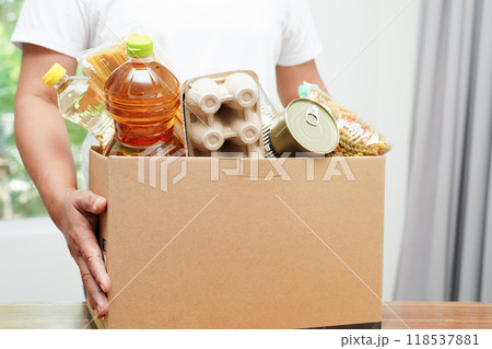 Foodstuffs in donation box for volunteer to help people. 118537881