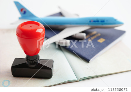 Visa and passport with approved stamp on document for tourism to immigration at airport in country. Visa and passport with approved stamp on document for tourism to immigration at airport in country. 118538071