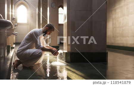 Preparing for Prayer: A Young Muslim Performing Ablution with Devotio.Generated image 118541879