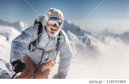 An adventurous elderly man with a distinguished gray beard showcases his seasoned skiing skills on the breathtaking snowy peaks of a mountainous landscape 118541964