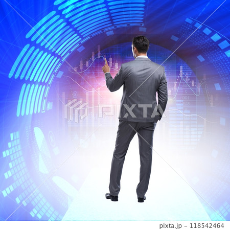 Businessman pressing virtual buttons in futuristic concept 118542464