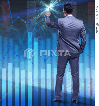 Businessman trader pressing virtual buttons Businessman trader pressing virtual buttons 118542475