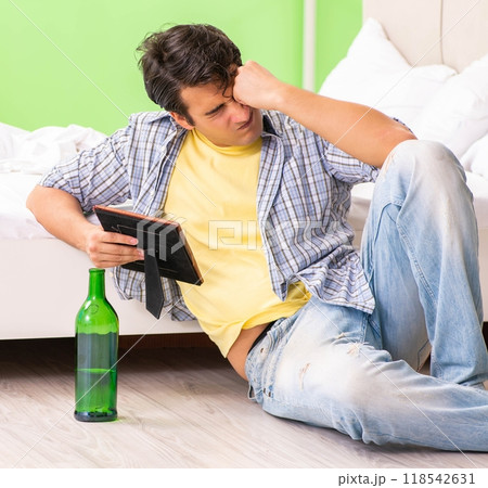 Young man sad in unhappy love concept Young man sad in unhappy love concept 118542631