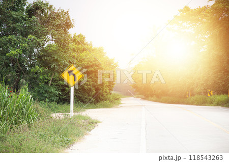 roadside signpost It shows that there is a curve ahead. 118543263