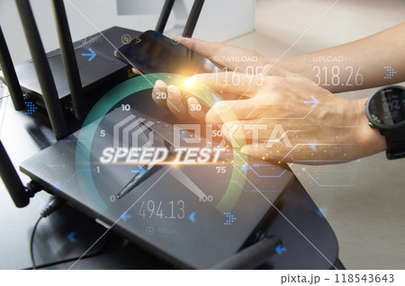 fast internet connection speedtest network bandwidth technology Man using high speed internet with smartphone and laptop computer. 5G quality, speed optimization. 118543643