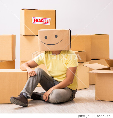 Happy man with box instead of his head Happy man with box instead of his head 118543977