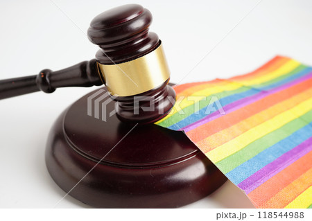 Gavel for judge lawyer on rainbow flag, symbol of LGBT pride month. 118544988