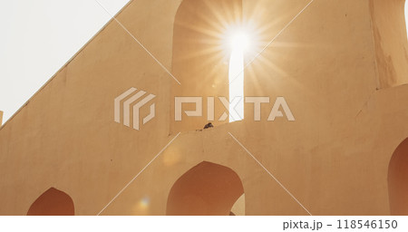 Jaipur, Rajasthan, India. Sun shining through instrument in old astronomical observation. Jantar Mantar, in Jaipur, is an astronomical observation site built in the early 18th century. It includes a 118546150