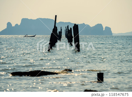 fisherman on boat at collapse bridge damaged by tsunami, Krabi fisherman on boat at collapse bridge damaged by tsunami, Krabi 118547675