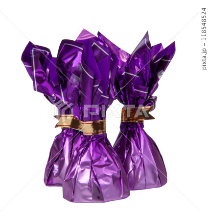 Chocolate sweets in violet foil isolated on the white 118548524
