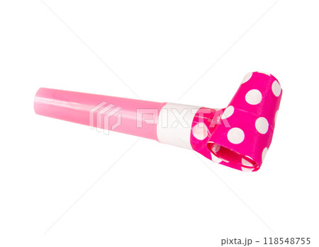 Rolled festive noisemaker or party whistle horn on the white 118548755