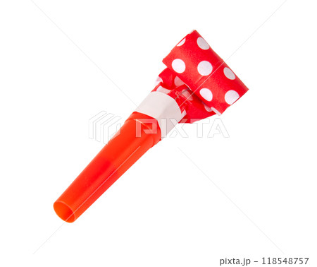 Rolled festive noisemaker or party whistle horn on the white 118548757