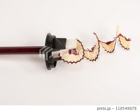 Pencil and spiral sawdust isolated on the white Pencil and spiral sawdust isolated on the white 118548878