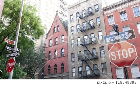 New York City building architecture. Urban residential house exterior. Real estate. Red brick facade 118549895
