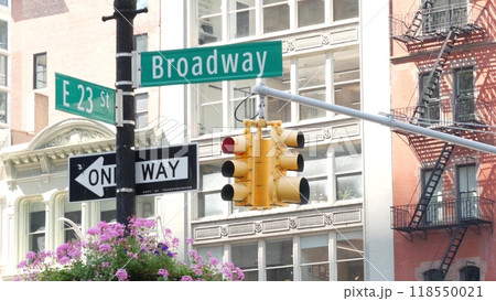 Broadway street road sign, Manhattan midtown architecture, New York City. Traffic signage of 23 st. 118550021