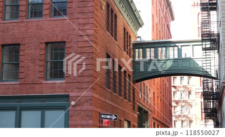 New York City Staple street skybridge. Industrial architecture, red brick building. Manhattan, USA. New York City Staple street skybridge. Industrial architecture, red brick building. Manhattan, USA. 118550027