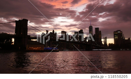 Brooklyn Bridge, Dumbo. New York City Manhattan downtown skyline. Dramatic twilight cloudy sky, USA. Brooklyn Bridge, Dumbo. New York City Manhattan downtown skyline. Dramatic twilight cloudy sky, USA. 118550205