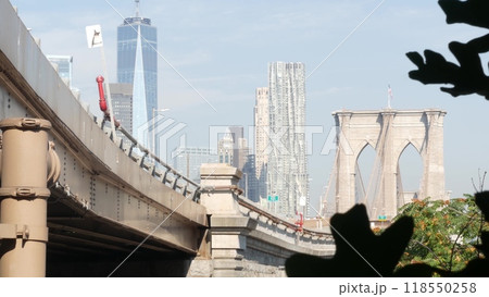 Brooklyn Bridge to Manhattan downtown. New York City skyline cityscape. World Trade Center, USA. 118550258