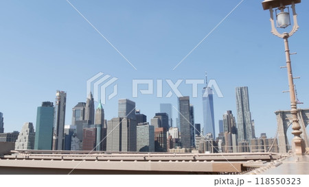 Brooklyn Bridge to Manhattan downtown. New York City skyline cityscape. World Trade Center, USA. 118550323