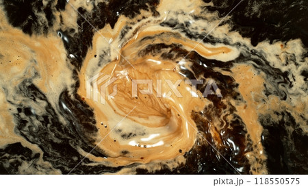Freeze Motion Detail Shot of Coffee Foam Swirling , Top Down View . 118550575
