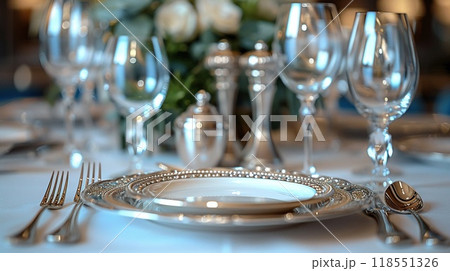 A set of cutlery displayed in a high-end restaurant. A set of cutlery displayed in a high-end restaurant. 118551326