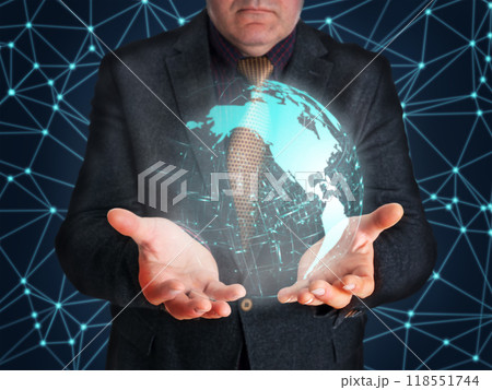 Businessman embracing holographic display of Globe grid with infographic elements 118551744