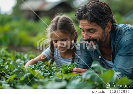 A family gardening together in their backyard. 118552983
