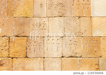 outer wall of church with carved memorial crosses outer wall of church with carved memorial crosses 118556008