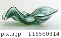 3d render of green glass abstract art in the shape of an elegant, wavy bowl with a smooth and glossy finish 118560314