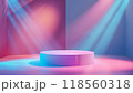 A round podium in the center of an empty room with colorful lighting and rays of light 118560318
