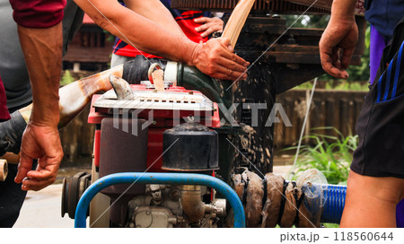 An image of a water pump being prepared to drain floodwater from a community. 118560644