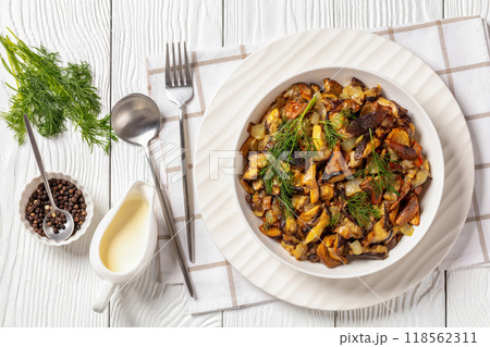 fried blend of wild mushrooms in a bowl 118562311