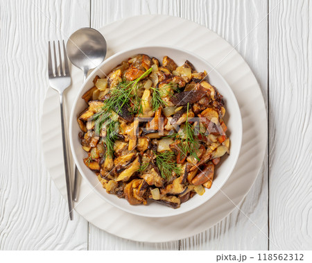 fried blend of wild mushrooms in a bowl 118562312