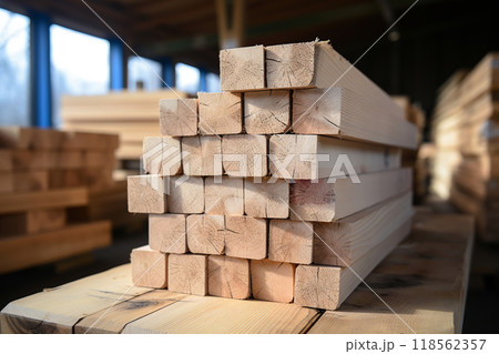 Sawmill atmosphere: stacks of freshly cut lumber, ready to become reliable building material. Excellent wooden planks close up ready to be turned into beautiful structures. Wood processing concept 118562357