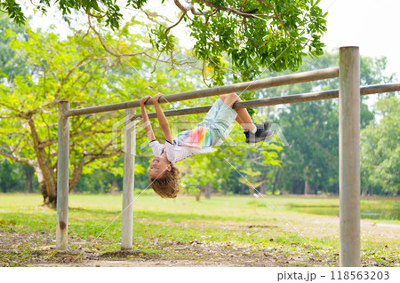 Child on playground. Active kid in school yard. 118563203