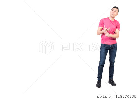 Thoughtful man counting on fingers in studio 118570539